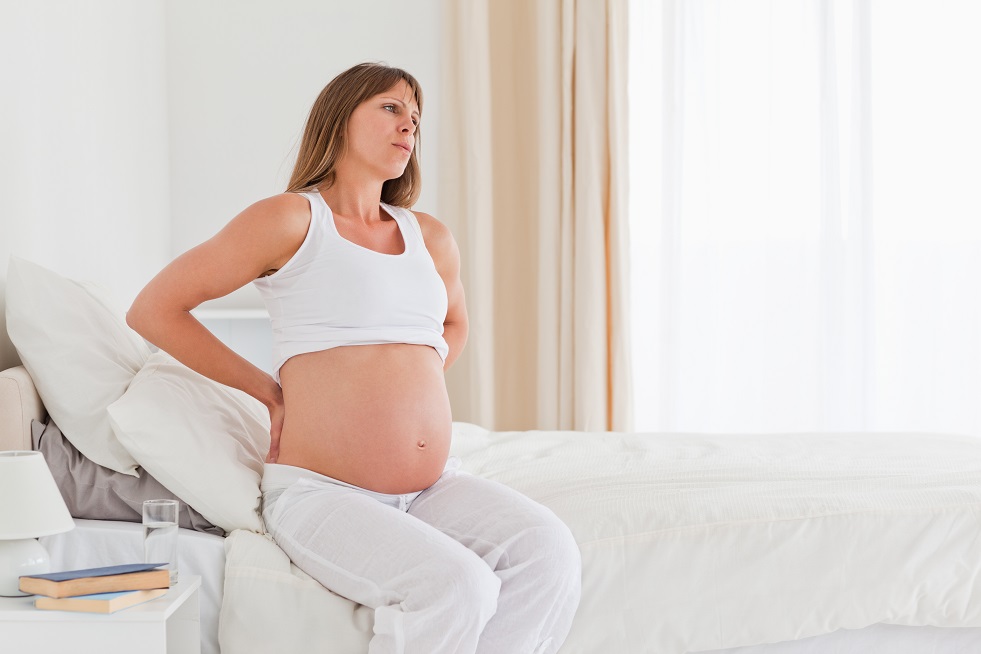 Болит спина при беременности — что делать