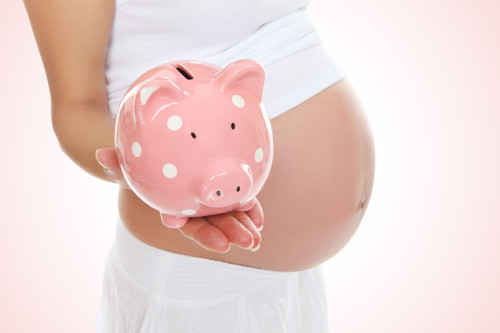Pregnant Woman and Piggy Bank