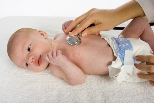 child medical examination by stethoscope