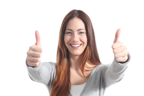 Beautiful Woman Smiling With Both Thumbs Up