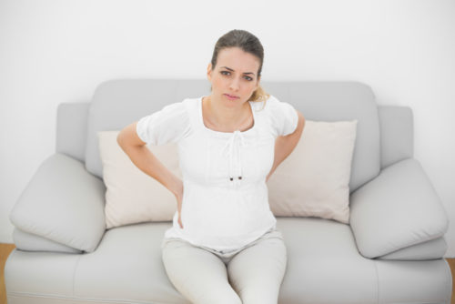 тянет спину болит живот при беременности